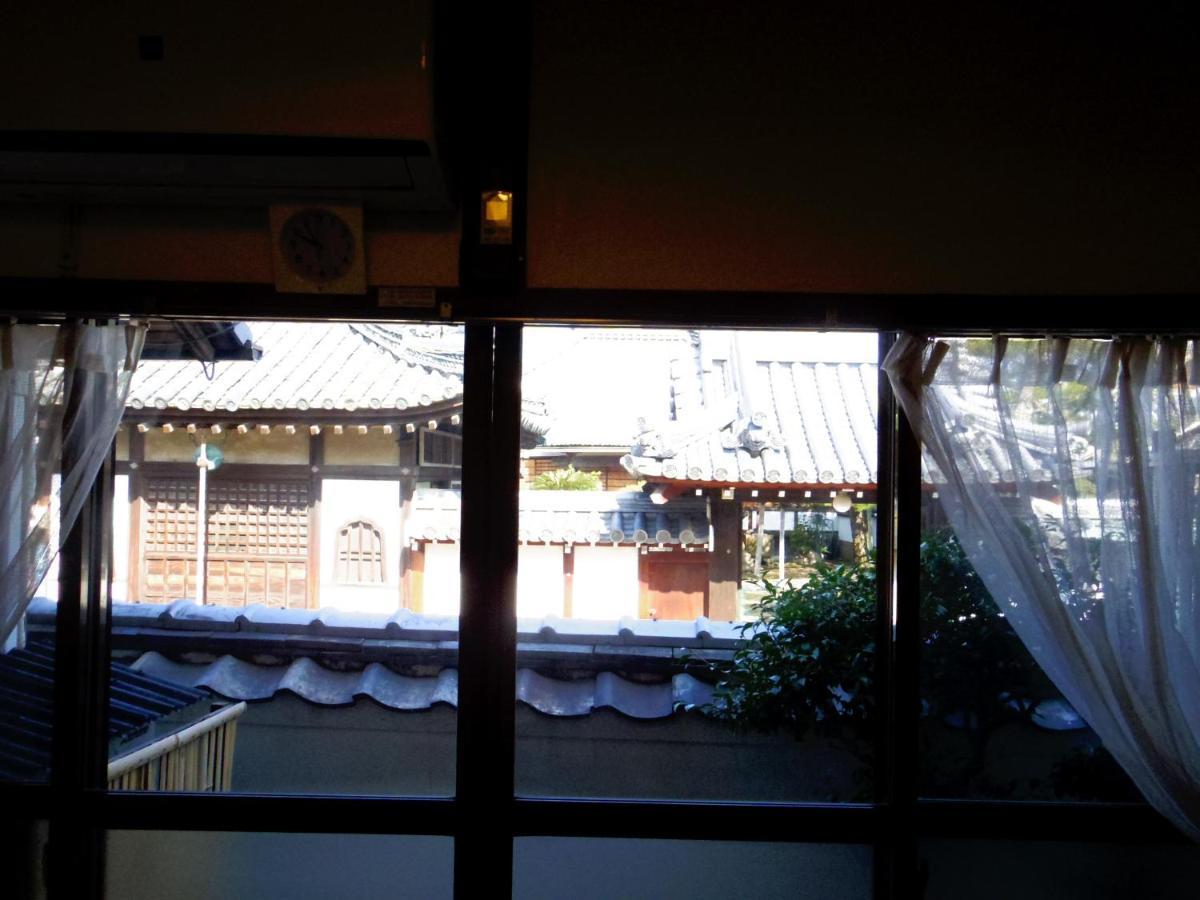 ゲストハウス喜平 Kaizuka Buitenkant foto