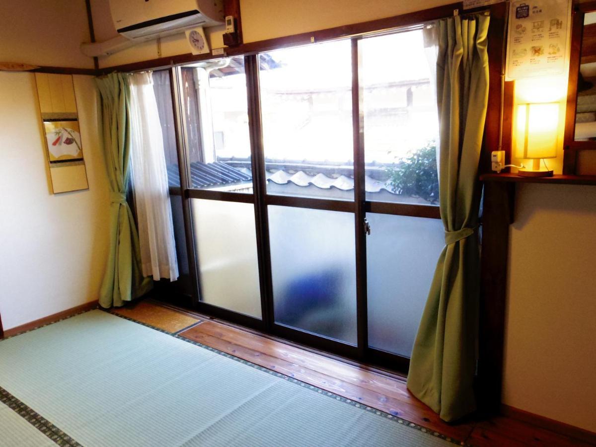 ゲストハウス喜平 Kaizuka Buitenkant foto